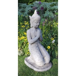 Kneeling Buddha sculpture